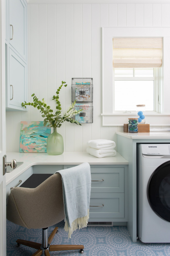 Beach style laundry room photo in Other