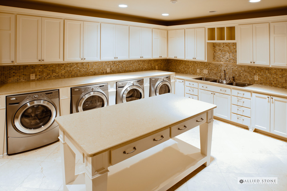 Example of a tuscan laundry room design in Houston