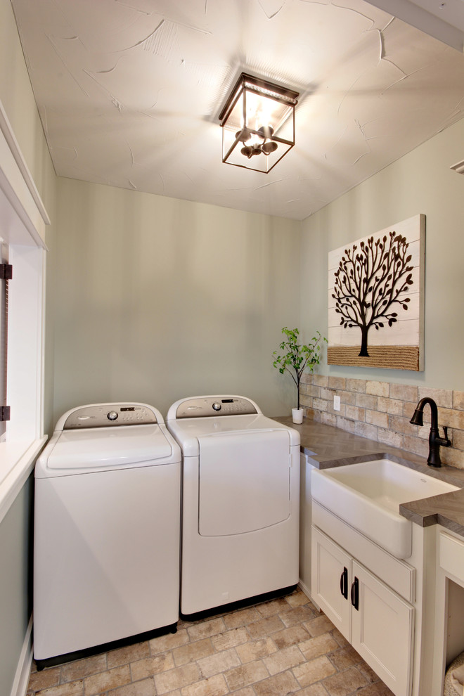 Photo of a mediterranean utility room in Grand Rapids.