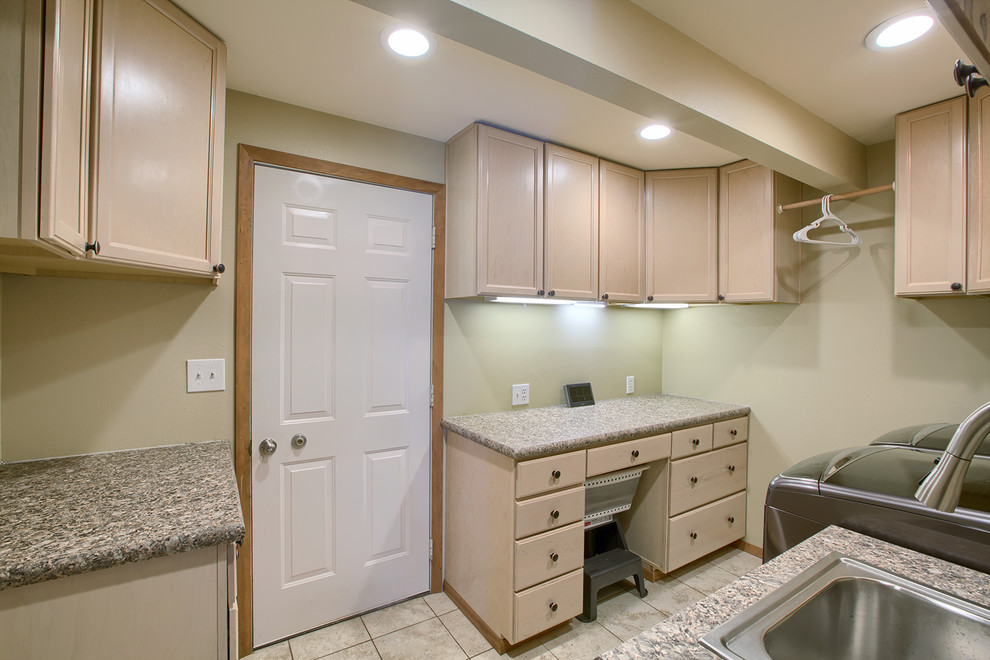 Inspiration for a mid-sized transitional galley ceramic tile and beige floor utility room remodel in Seattle with a drop-in sink, recessed-panel cabinets, beige cabinets, granite countertops, beige walls, a side-by-side washer/dryer and gray countertops
