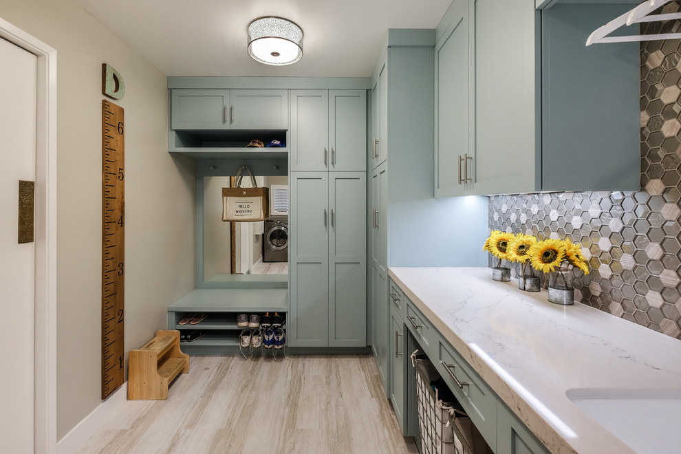 Example of a mid-sized 1960s u-shaped porcelain tile and beige floor utility room design in Sacramento with an undermount sink, shaker cabinets, gray cabinets, quartz countertops, gray walls, a side-by-side washer/dryer and white countertops