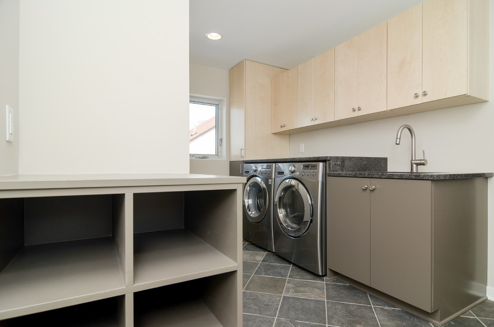 Inspiration for a contemporary laundry room remodel in Minneapolis