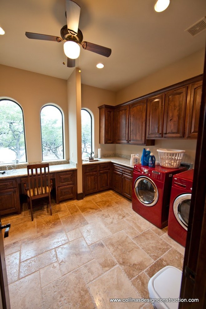 Example of a tuscan laundry room design in Austin