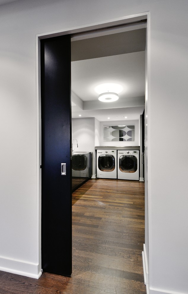 Minimalist laundry room photo in Atlanta
