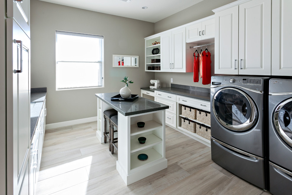 Example of a cottage laundry room design in Phoenix