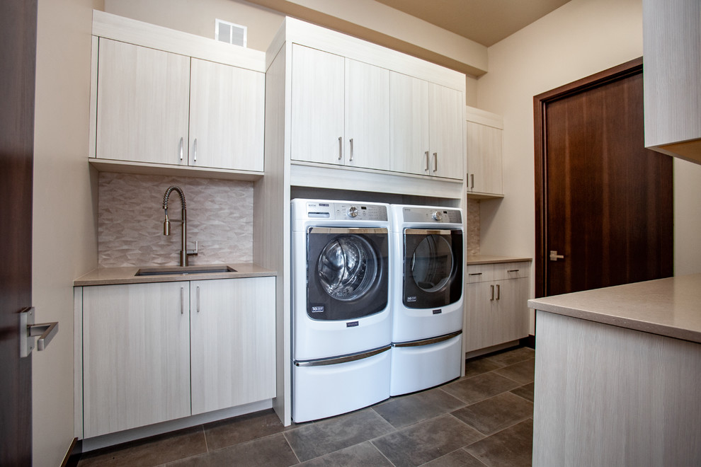 This is an example of a traditional utility room in Denver.