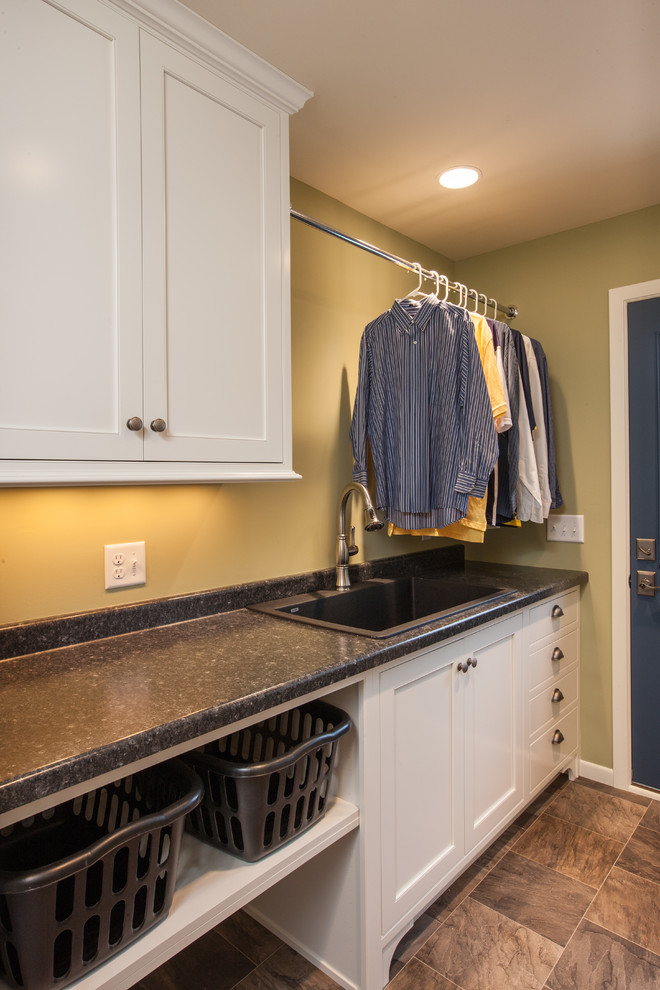 Mid-sized elegant galley vinyl floor utility room photo in Minneapolis with a drop-in sink, white cabinets, quartz countertops, green walls and recessed-panel cabinets