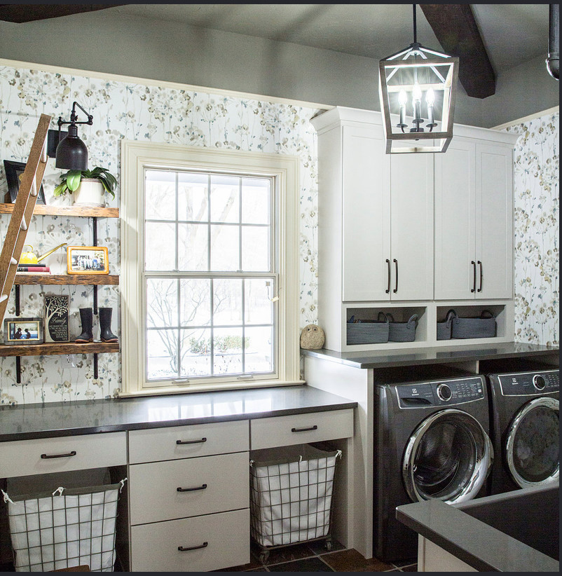Example of a mid-sized cottage slate floor dedicated laundry room design in Cleveland with a farmhouse sink, quartz countertops, multicolored walls, a side-by-side washer/dryer and gray countertops