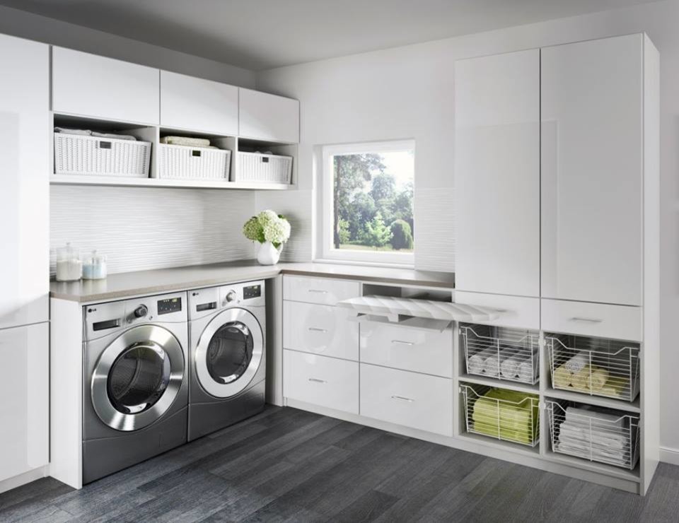 Example of a transitional laundry room design in Orange County