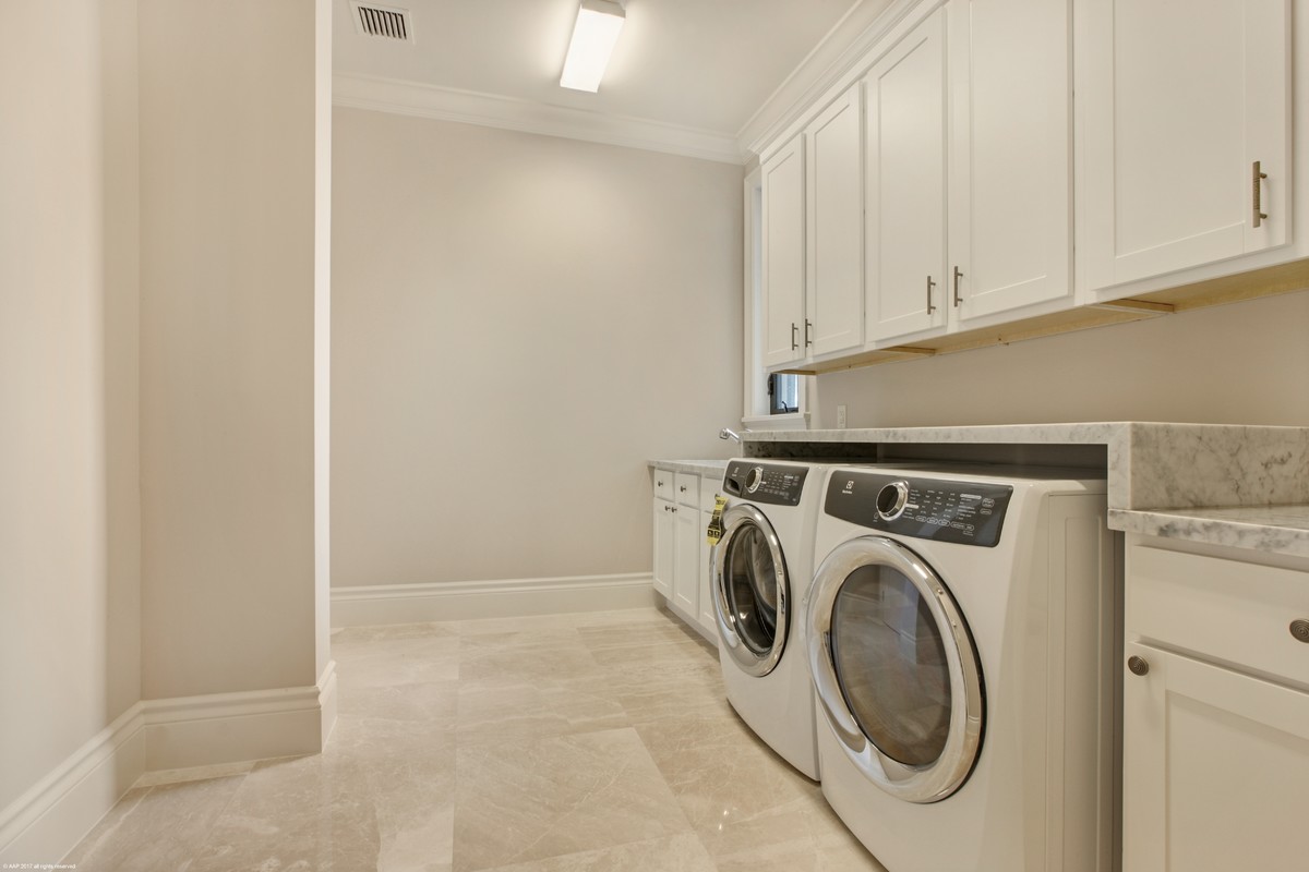 Inspiration for a transitional laundry room remodel in Miami