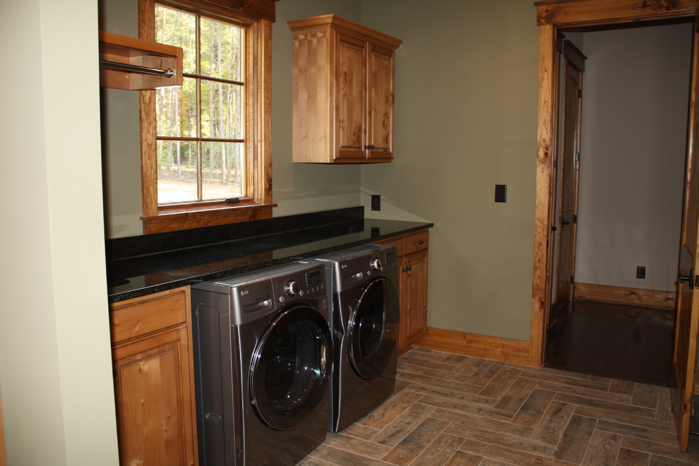 Design ideas for a rustic utility room in Charlotte.