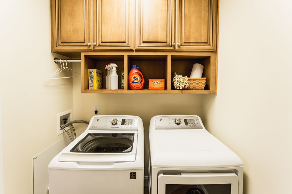 Open shelves and hanging storage Traditional Laundry Room