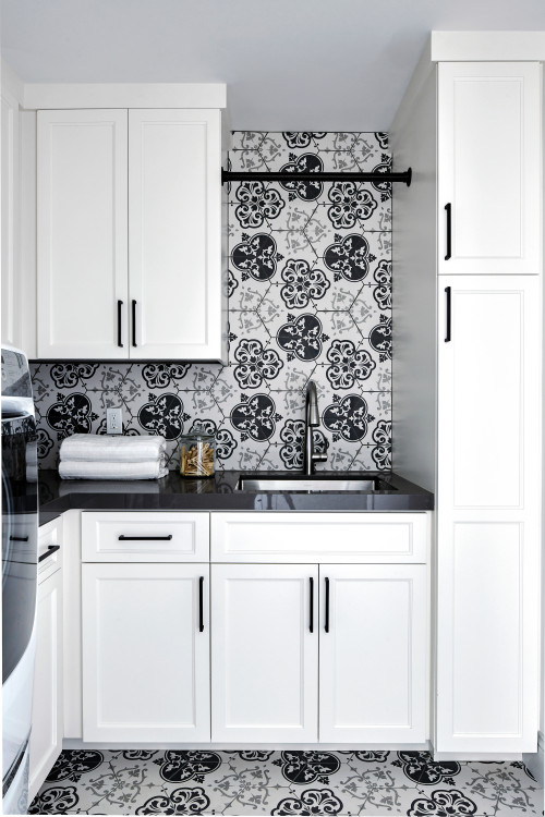 The Tile That Ties: Transitional Laundry Room with Black and White Backsplash