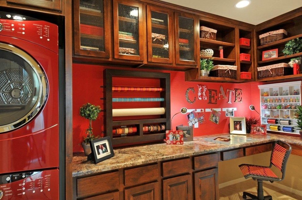 Inspiration for a timeless laundry room remodel in Phoenix with dark wood cabinets