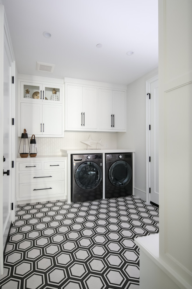 Photo of a beach style utility room in Orange County.