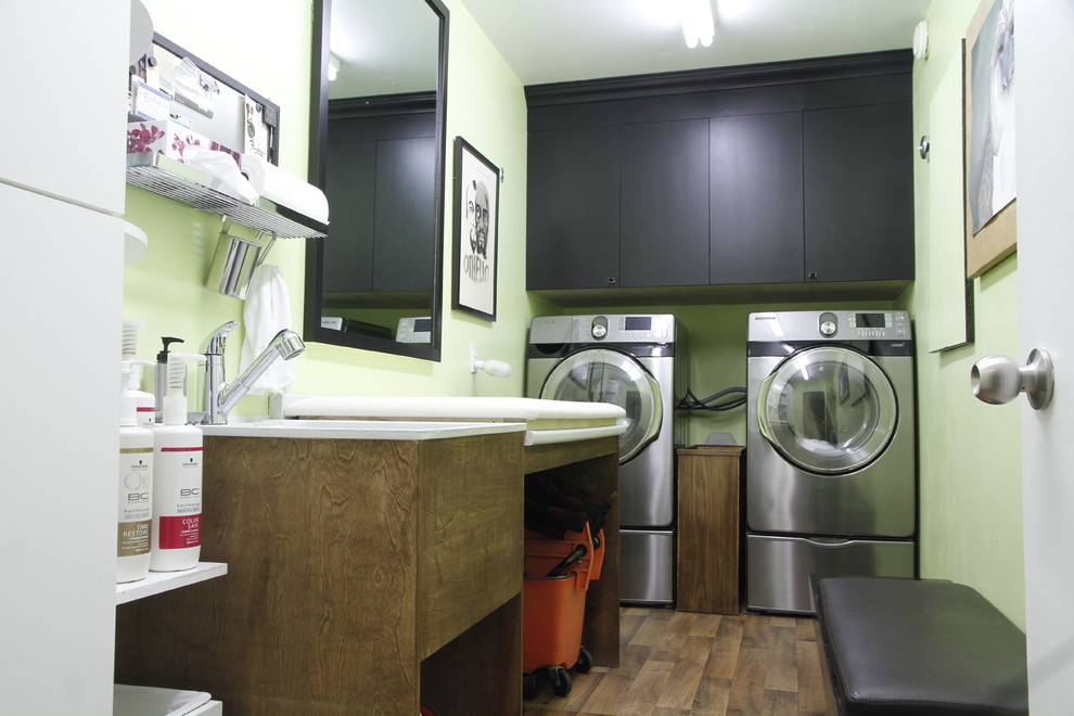Inspiration for an industrial laundry room remodel in Montreal