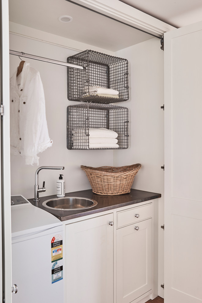 Inspiration for a timeless laundry room remodel in Sydney