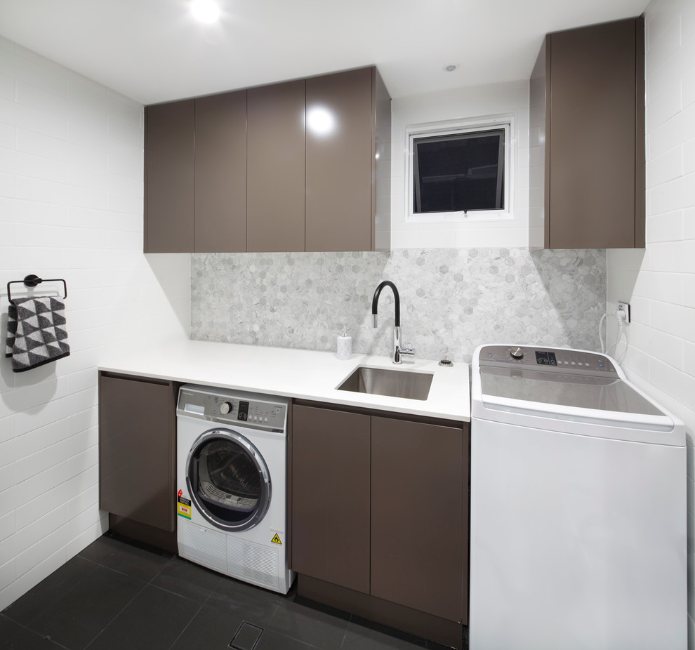 Inspiration for a timeless laundry room remodel in Sydney