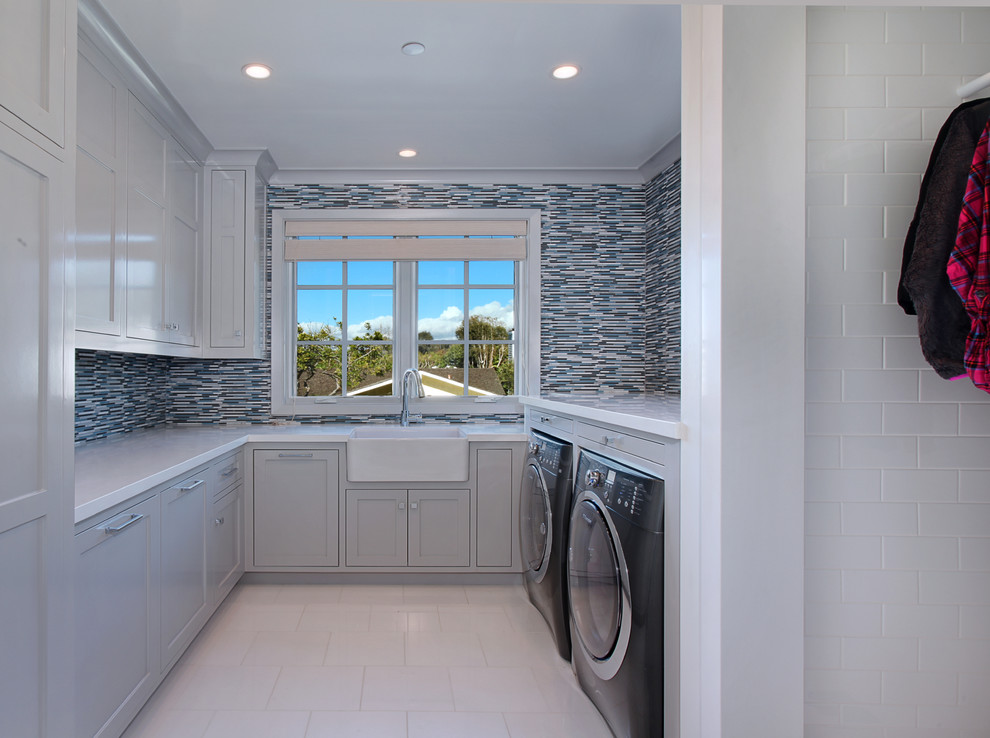 Example of a beach style laundry room design in Orange County