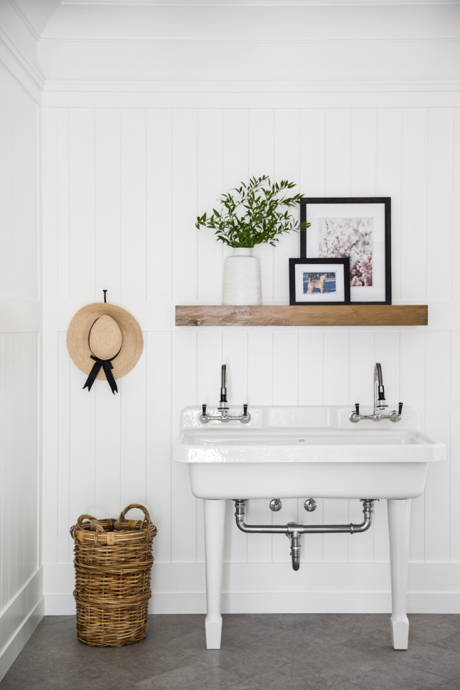 Inspiration for a classic utility room in Vancouver with an utility sink, white walls, grey floors and tongue and groove walls.