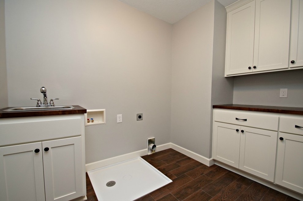 Example of an arts and crafts laundry room design in Minneapolis