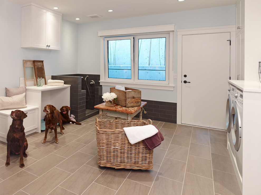 Utility room - large traditional porcelain tile utility room idea in Vancouver with shaker cabinets, white cabinets, quartz countertops, blue walls and a side-by-side washer/dryer