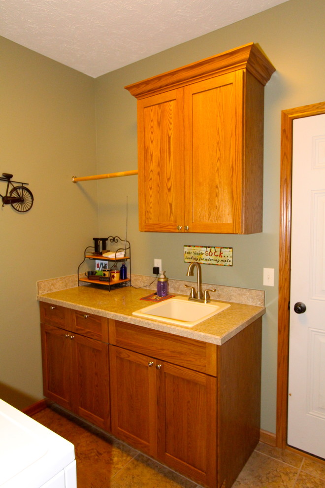Inspiration for a classic utility room in Omaha.
