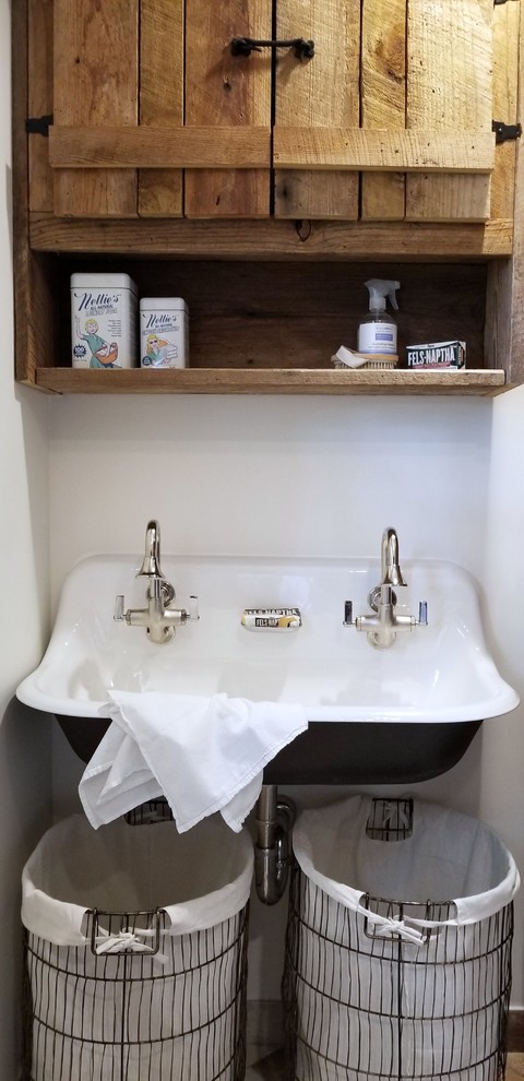 Medium sized rural galley separated utility room in Atlanta with an utility sink, raised-panel cabinets, granite worktops, white walls, a side by side washer and dryer, beige worktops and dark wood cabinets.