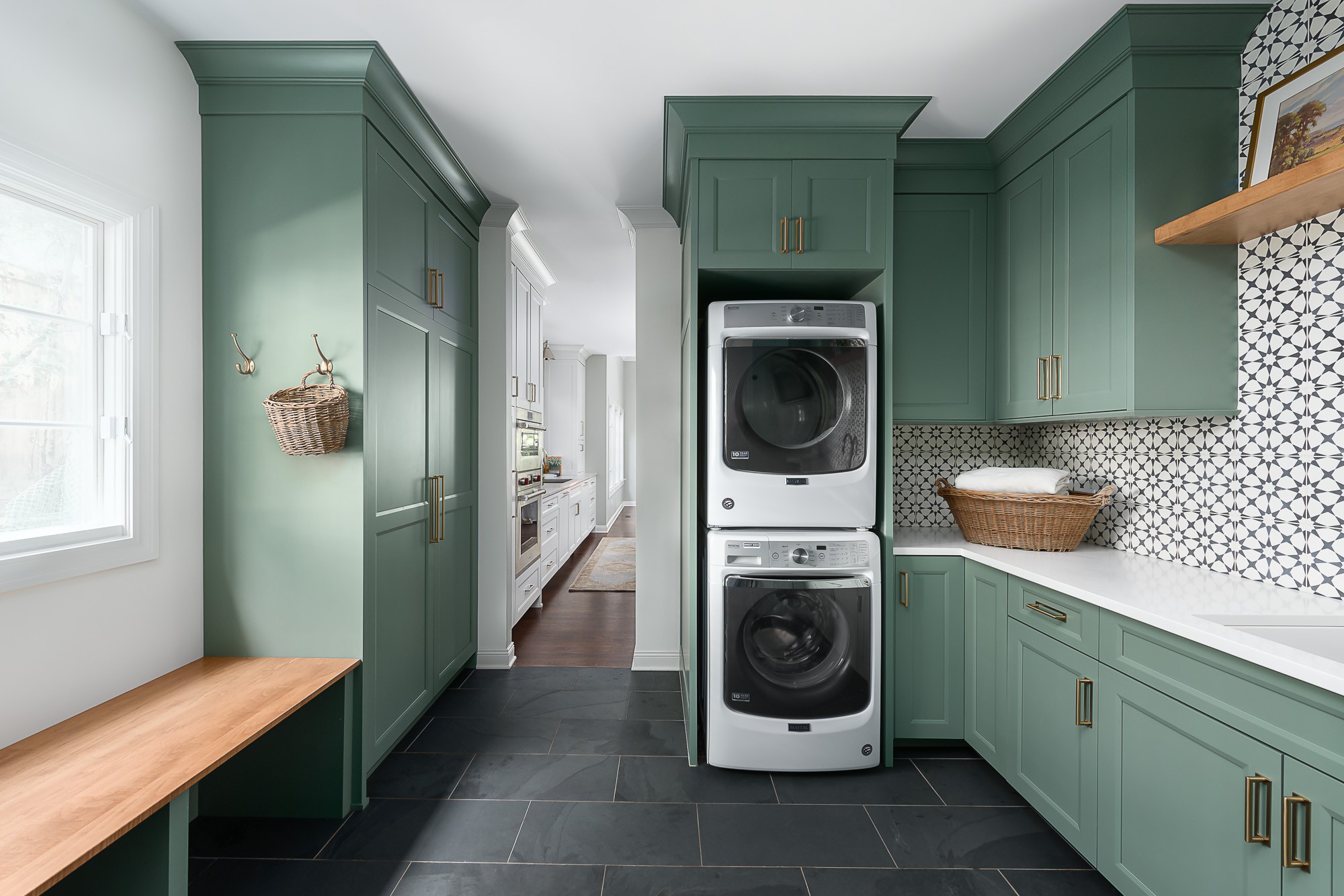 The Laundry/Dog Room: Dark Green Cabinets Layered On Classic Black