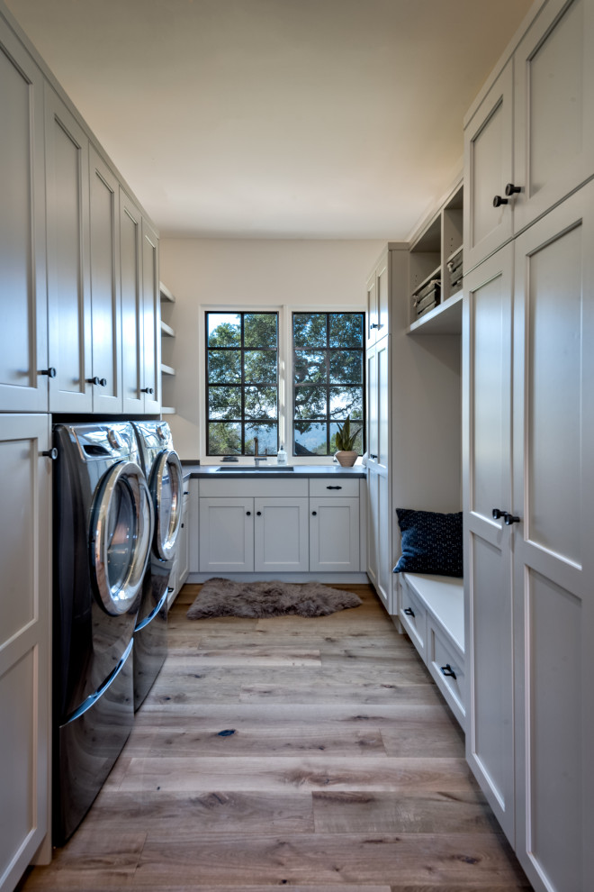 Example of a transitional laundry room design in San Francisco