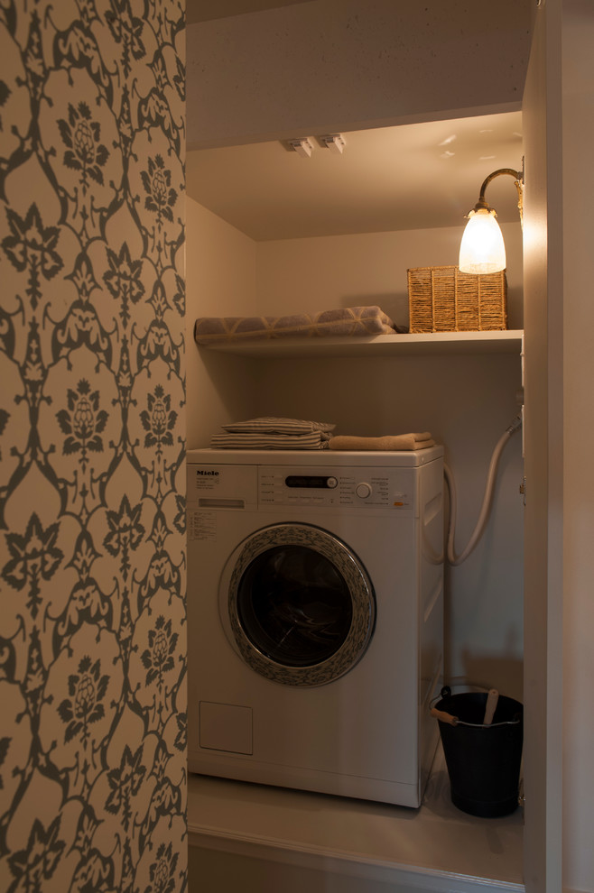 Example of a danish laundry room design in Other