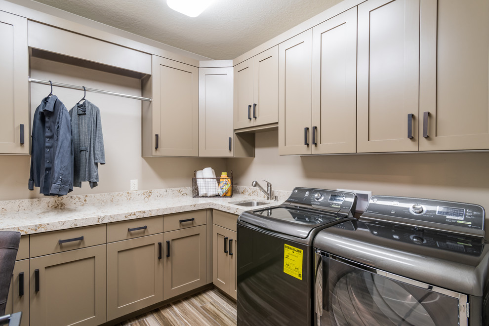 Medium sized classic u-shaped utility room in Salt Lake City with a submerged sink, shaker cabinets, beige cabinets, granite worktops, beige walls, porcelain flooring and a side by side washer and dryer.