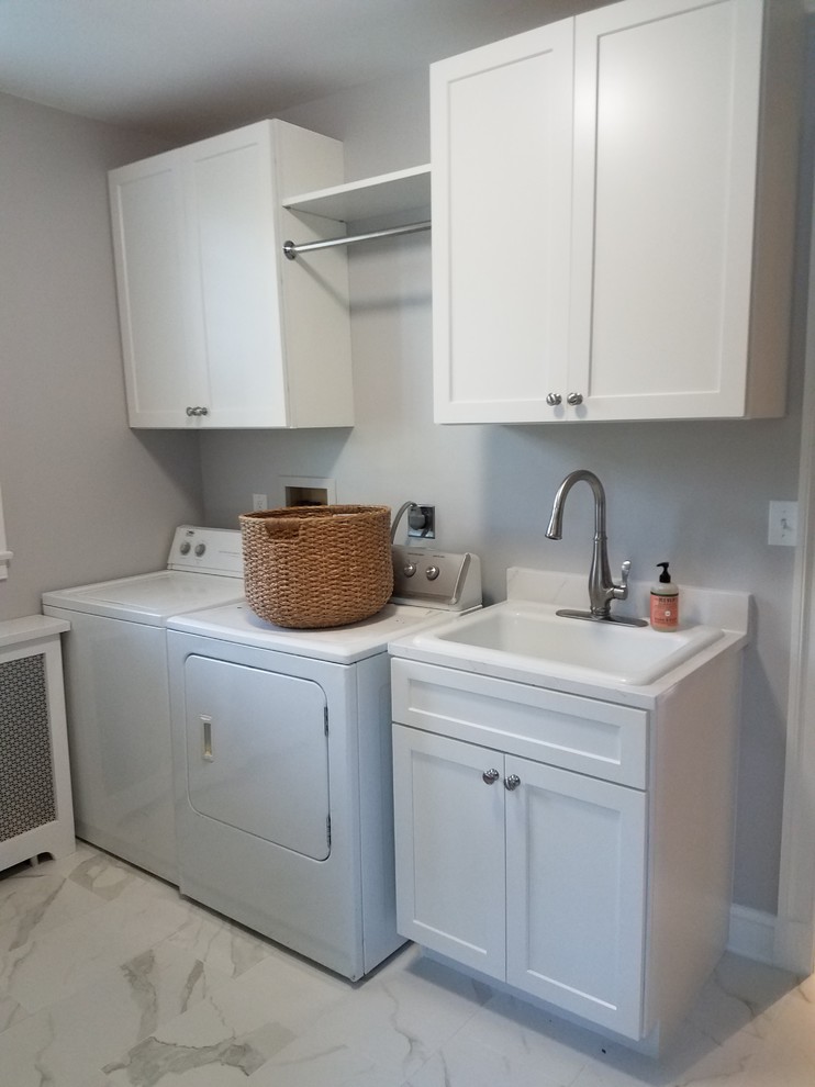 Photo of a contemporary utility room in Baltimore with a built-in sink, marble flooring and white floors.