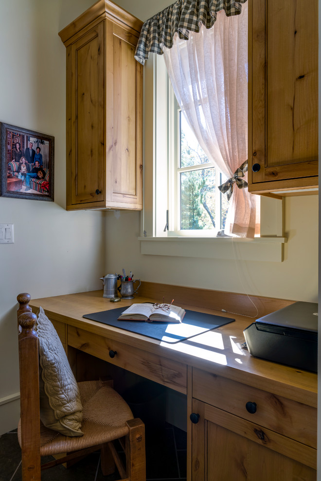 Small mountain style galley utility room photo in Other with recessed-panel cabinets, medium tone wood cabinets and wood countertops
