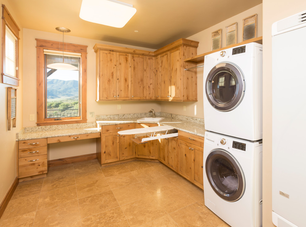 Mountain style laundry room photo in Denver