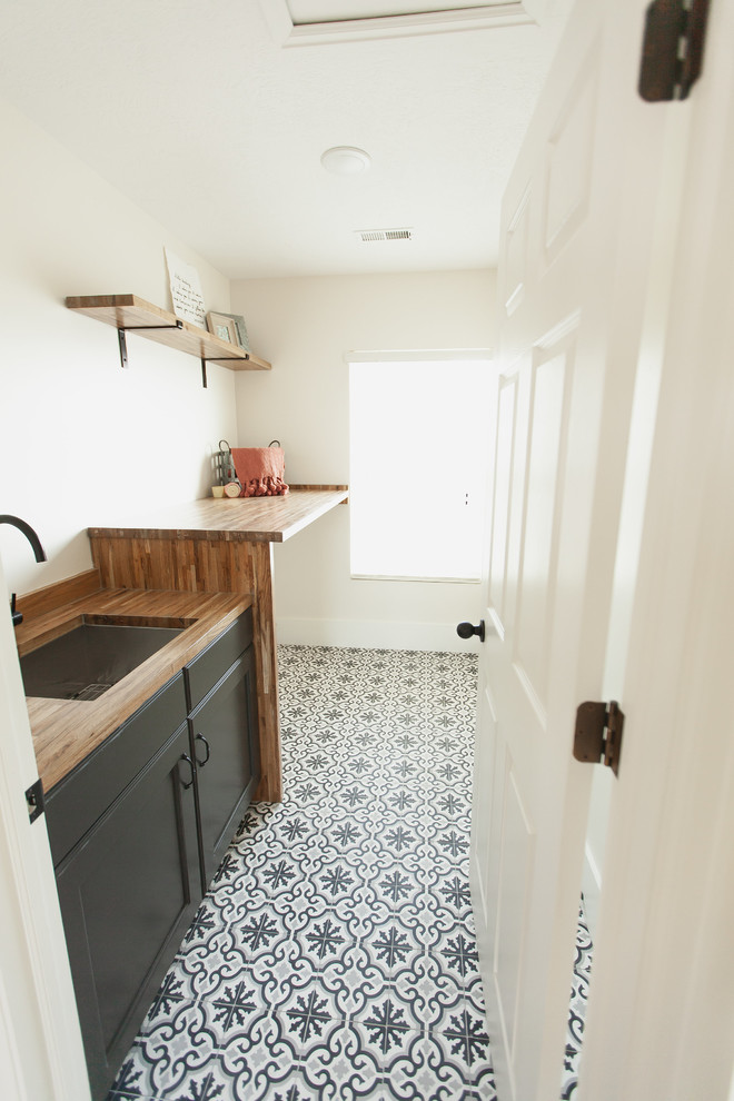 Inspiration for an industrial laundry room remodel in Salt Lake City