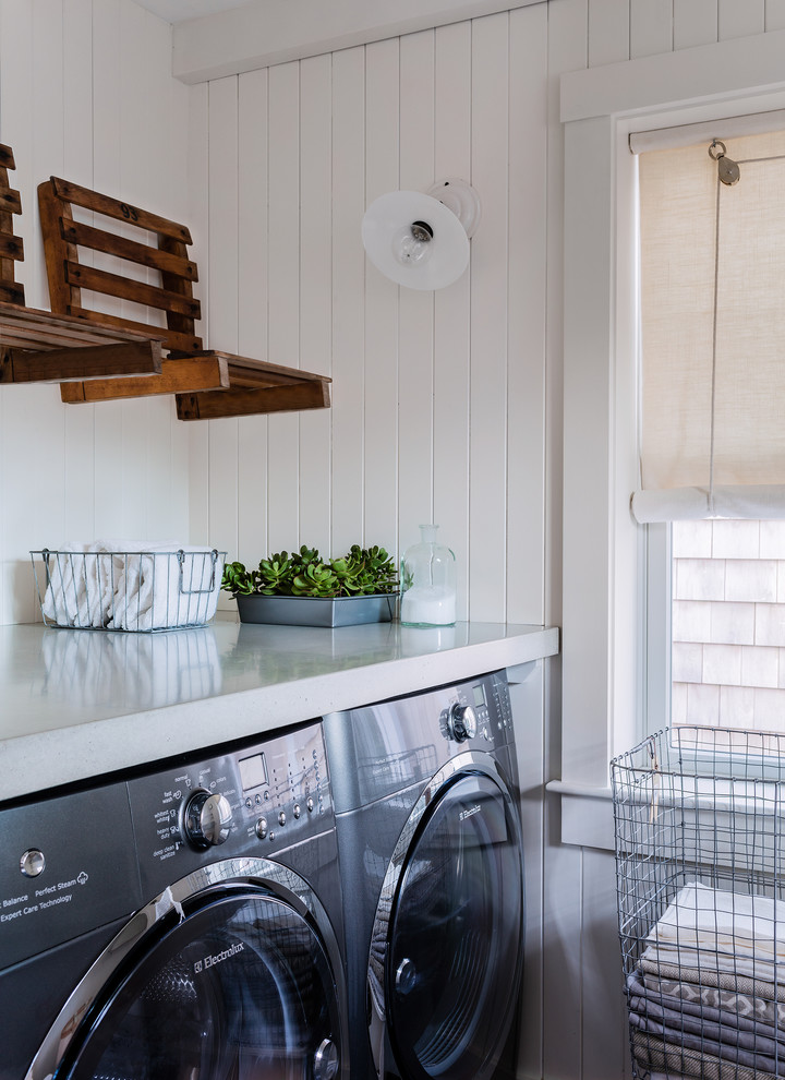 Transitional galley marble floor and blue floor utility room photo in Boston with concrete countertops, white walls and a side-by-side washer/dryer