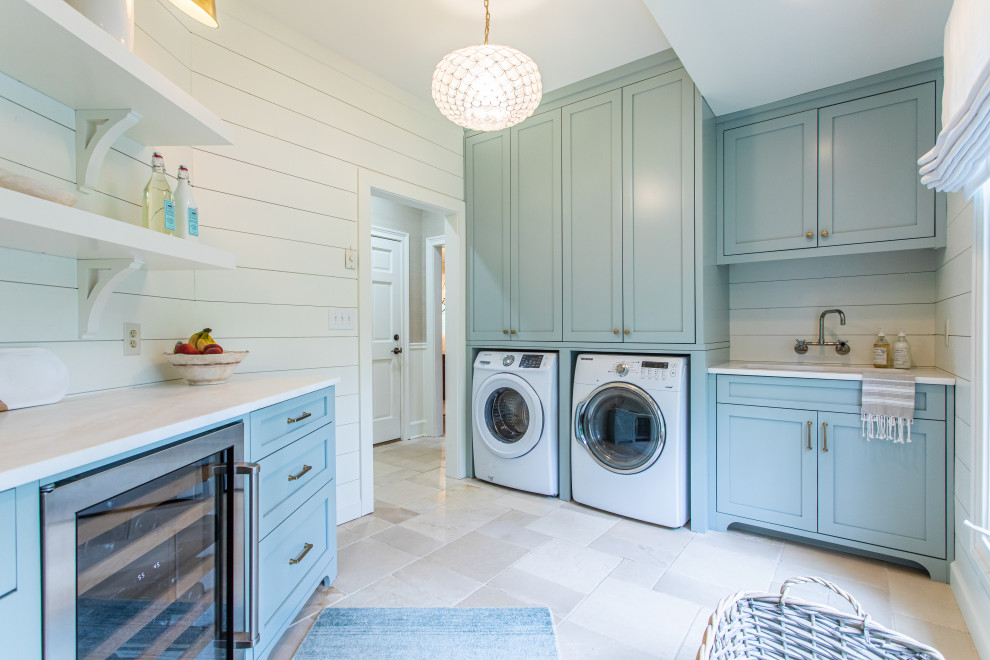 Transitional shiplap wall laundry room photo in Atlanta with an undermount sink, shaker cabinets, turquoise cabinets, white backsplash, shiplap backsplash, white walls, an integrated washer/dryer and white countertops
