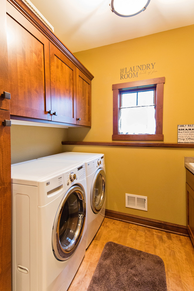Inspiration for a craftsman laundry room remodel in Milwaukee