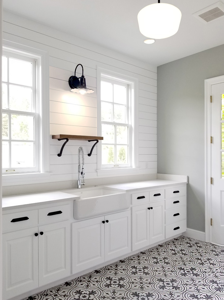 Example of a cottage laundry room design in Portland