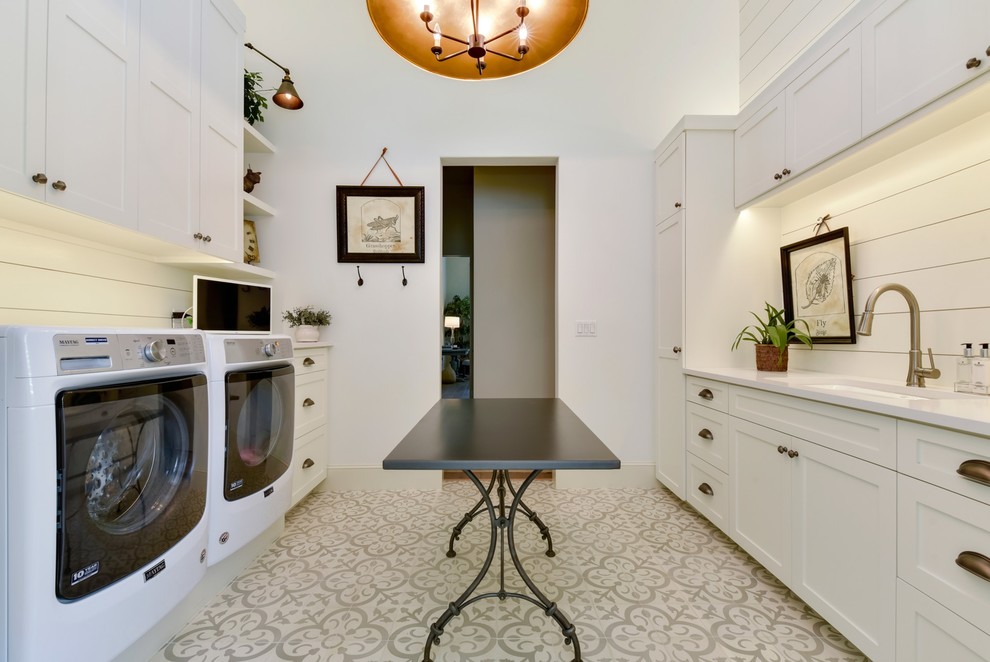 Inspiration for a transitional laundry room remodel in Austin