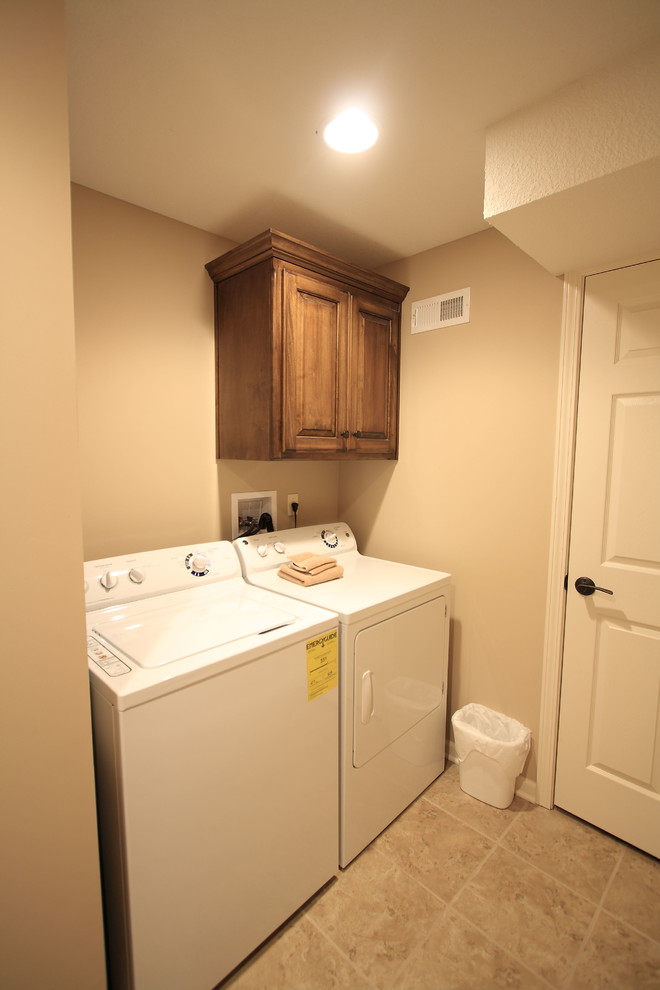 Transitional laundry room photo in Kansas City