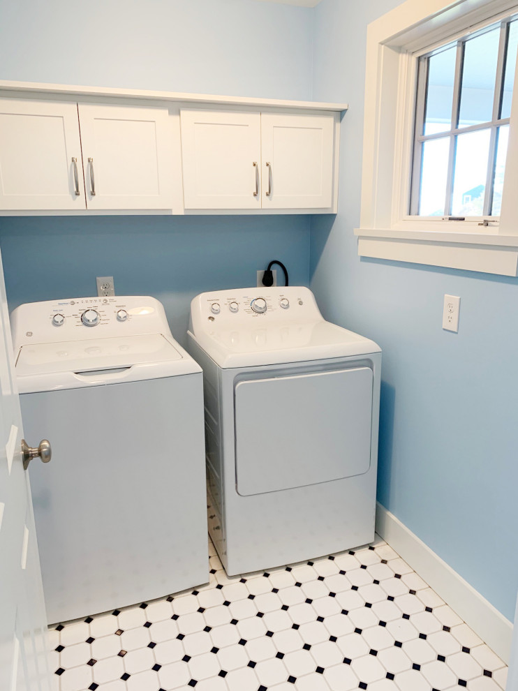 Design ideas for a small beach style separated utility room in Providence with shaker cabinets, white cabinets, ceramic flooring, a side by side washer and dryer and multi-coloured floors.