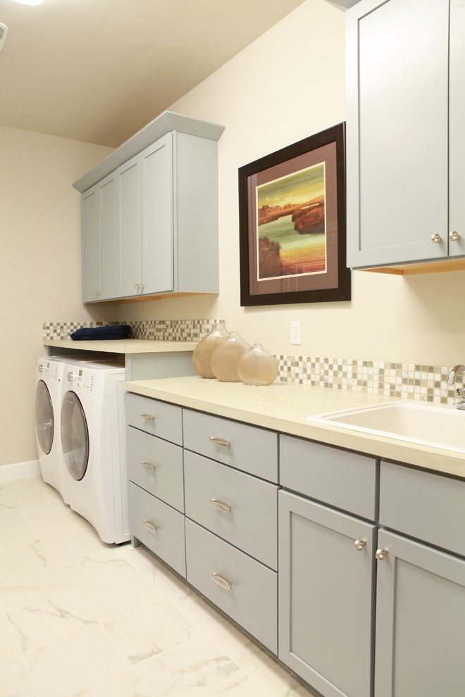 This is an example of a beach style utility room in Seattle.