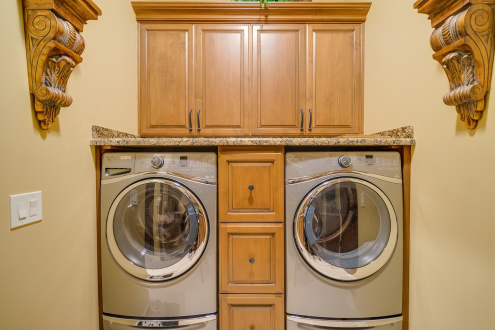 Southwest laundry room photo in Other with a side-by-side washer/dryer