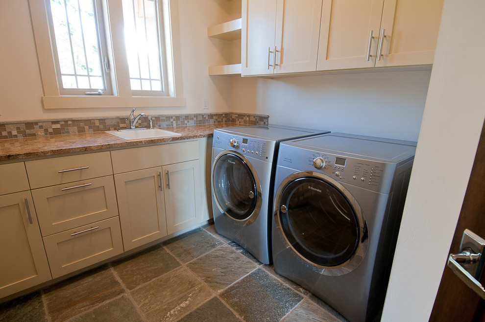 This is an example of a contemporary utility room in Portland.