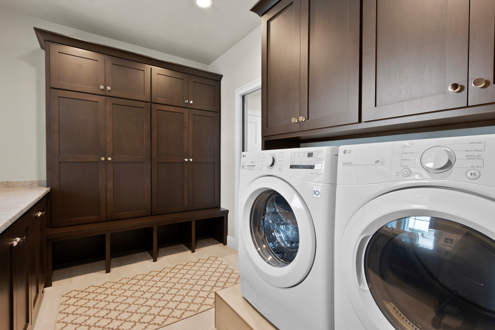 Utility room - large transitional galley vinyl floor and gray floor utility room idea in Other with an undermount sink, shaker cabinets, medium tone wood cabinets, marble countertops, marble backsplash, gray walls, a side-by-side washer/dryer and multicolored countertops