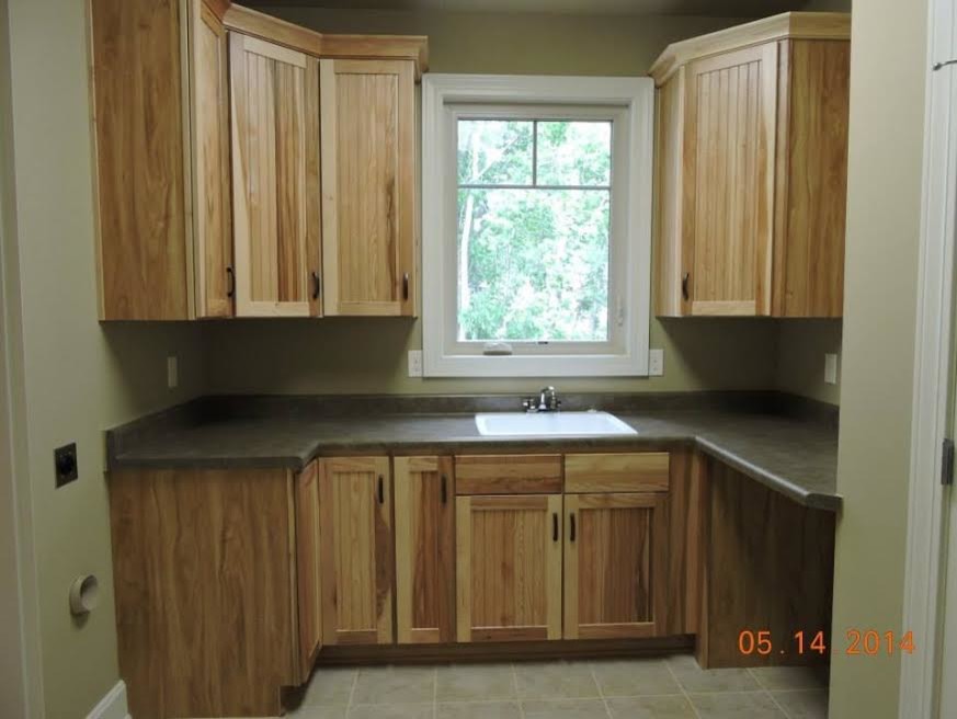 Example of a mountain style laundry room design in Other