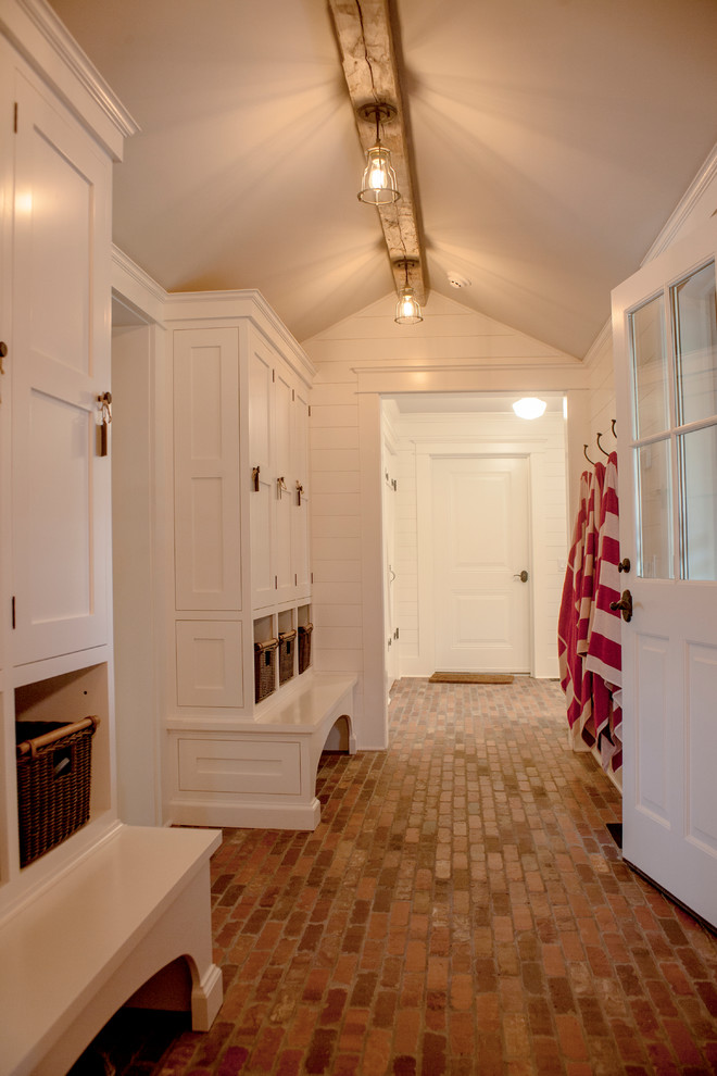 Example of a beach style laundry room design in New York