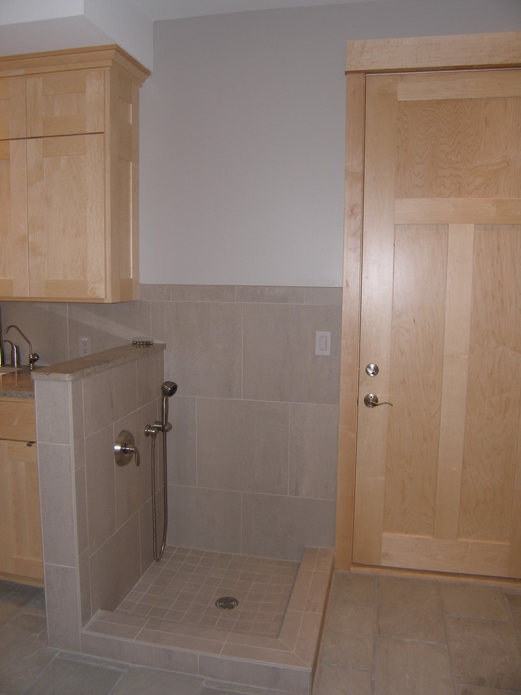 Example of a trendy laundry room design in Milwaukee